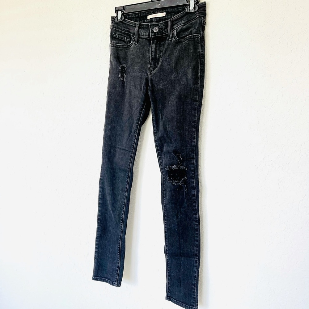Levi’s Black Distressed 711 Skinny Jeans